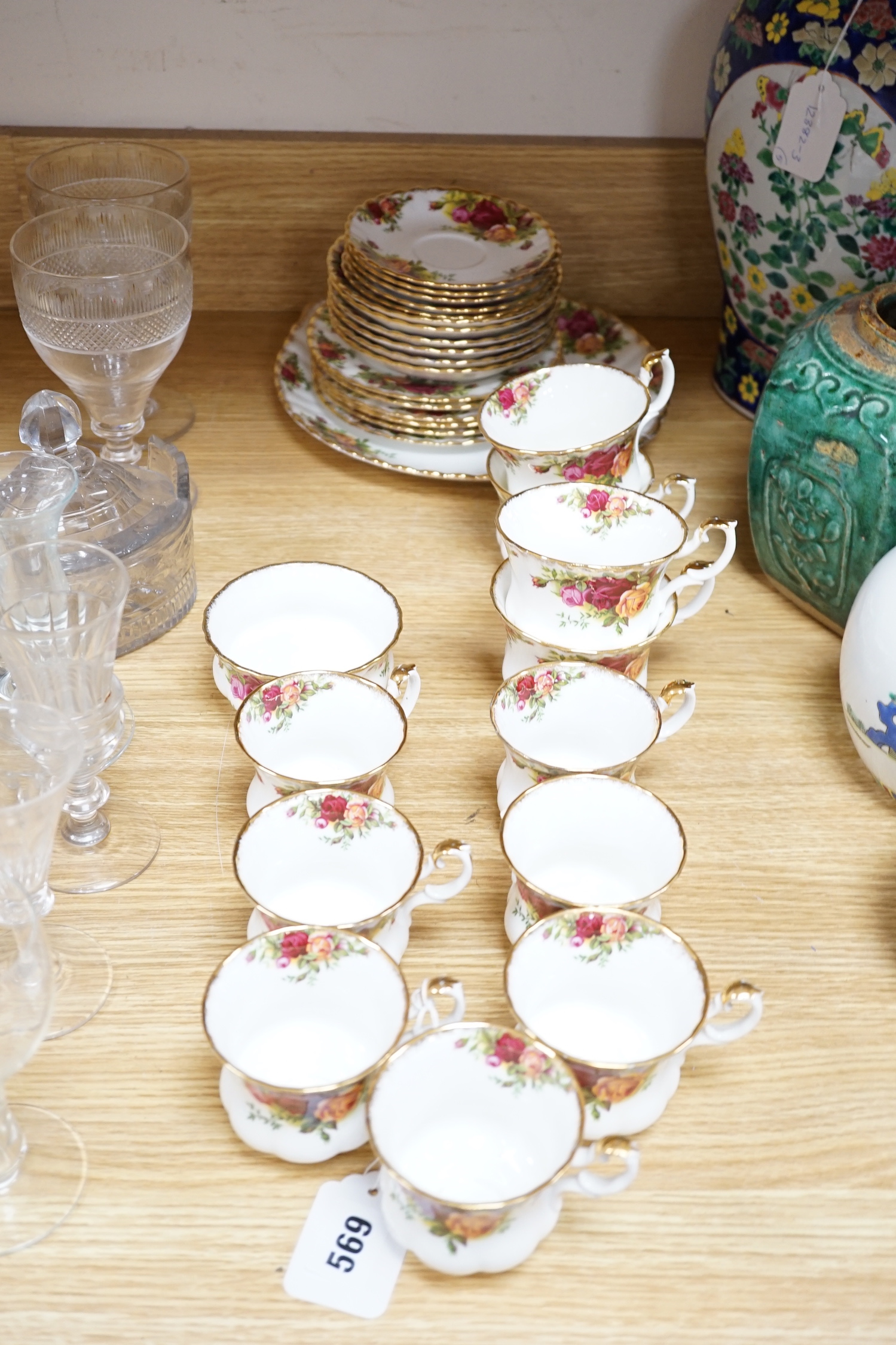 A quantity of Royal Albert old country roses pattern teawares including teapot, various cups and saucers, side plates, cake stand, coffee, pot, quartz, clock, sugar bowl, trays, etc.